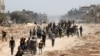 Palestinians who had taken refuge in Rafah, leave the city to return to Khan Yunis after Israel pulled its ground forces out of the southern Gaza Strip, on Apr. 7, 2024. 