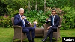 El presidente estadounidense Joe Biden se reúne con el primer ministro británico Rishi Sunak en el número 10 de Downing Street en Londres, Gran Bretaña, el 10 de julio de 2023. REUTERS/Kevin Lamarque