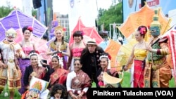 Performers pose for pictures during the Sawasdee DC Thai Festival 2023.