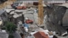 FILE — The collapsed portion of the construction site of the Pinheiros subway station in Sao Paulo, Brazil, Jan. 12, 2007. Executives and firms involved in the project have been fined $48 million, according to a ruling the AFP viewed Feb. 17, 2024. Seven died in the collapse.
