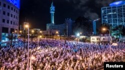 A view shows Israelis protesting as Israeli Prime Minister Benjamin Netanyahu's nationalist coalition government presses on with its judicial overhaul, in Tel Aviv, Israel, March 25, 2023.