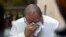 Paul Jamrowski, father and father in-law of two victims of the El Paso Walmart mass shooting, weeps outside federal court in El Paso, Texas, July 5, 2023. Patrick Crusius, accused of nearly two dozen fatal shootings, received multiple life terms July 7.