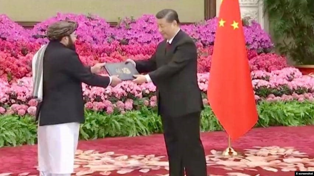 The Taliban's ambassador to China, Asadullah Bilal Karimi, left, is seen presenting his credentials to Chinese President Xi Jinping, in a photo posted on X Jan. 30, 2024, by Abdul Qahar Balkhi, spokesperson of the Taliban's foreign ministry.