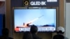 A TV screen shows an image of North Korea's missile launch during a news program at the Seoul Railway Station in Seoul, South Korea, April 20, 2024. 