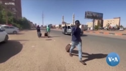 Khartoum Residents Drag Bags in Streets to Flee