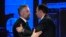 FILE - Socialist Party leader Pedro Nuno Santos, left, and Luis Montenegro, leader of the Social Democratic Party, greet each other before an election TV debate in Lisbon, Feb. 19, 2024. 