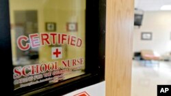 This Aug. 15, 2016, photo shows the front of the Bellefonte Area School District certified school nurse's office in Pennsylvania.