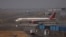FILE - An Air India passenger aircraft is seen on the tarmac at Chhatrapati Shivaji International airport in Mumbai, India, Feb. 14, 2023