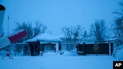 FILE - A view of the entrance of the prison colony in the town of Kharp, in the Yamalo-Nenetsk region about 1,900 kilometers (1,200 miles) northeast of Moscow, Russia, Jan. 23, 2024.