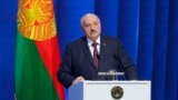 In this photo provided by the Belarusian Presidential Press Service, Belarusian President Alexander Lukashenko delivers a state-of-the nation address in Minsk, March 31, 2023. (Belarusian Presidential Press Service via AP)