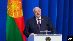 FILE - In this photo provided by the Belarusian Presidential Press Service, Belarusian President Alexander Lukashenko delivers a state-of-the nation address in Minsk, March 31, 2023. (Belarusian Presidential Press Service via AP)