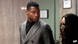 US actor Jonathan Majors leaves a courtroom in New York on Monday, December 18, 2023.