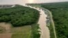 This photo taken on March 13, 2023 shows an aerial view of Chong Prolay floating village on Tonle Sap lake in Siem Reap province. 