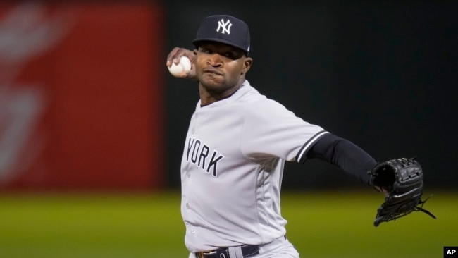 New York Yankees' Domingo German pitches to an Oakland Athletics batter during the eighth inning of a baseball game in Oakland, California, June 28, 2023. German had a perfect game.