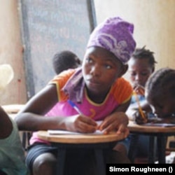 Young Sierra Leonean girl receives basic education from humanitarian agency GOAL (Photo: Simon Roughneen)