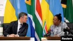 Ukrainian Foreign Minister Dmytro Kuleba, left, looks on during his meeting with his South African counterpart Naledi Pandor as they hold a joint press conference in Pretoria, South Africa, Nov. 6, 2023. (Jacoline Schoonees/DIRCO/Handout via Reuters)
