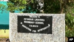 Image from video shows the sign of the Lhubiriha Secondary School following an attack on the school near the border with Congo, in Mpondwe, Uganda, June 17, 2023.