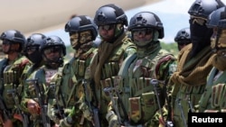 (FILE) Members of the second contingent of Kenyan police gather after arriving in the Caribbean country as part of a peacekeeping mission, in Port-au-Prince, Haiti July 16, 2024.