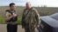 One of the two injured journalists, Idrak Jamalbeyli, who reports for VOA’s Azerbaijani Service, interviews a Ukrainian soldier. 
