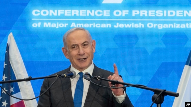 FILE - Prime Minister Benjamin Netanyahu speaks during a gathering of Jewish leaders at the Museum of Tolerance in Jerusalem, Feb. 18, 2024.