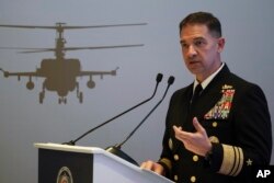FILE - U.S. Navy Vice Admiral Brad Cooper speaks in Abu Dhabi, United Arab Emirates, Feb. 21, 2023. Since the U.S. announced Operation Prosperity Guardian, none of the 1,200 merchant ships that went through the Red Sea region was hit by drone or missile strikes, Cooper said.