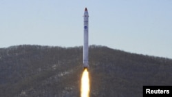 FILE - A test related to the development of a reconnaissance satellite is seen in this undated photo released on Dec. 19, 2022, by North Korea's Korean Central News Agency.