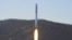 FILE - A test related to the development of a reconnaissance satellite is seen in this undated photo released on Dec. 19, 2022, by North Korea's Korean Central News Agency.