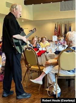 Bob recently performing for residents of a retirement home.