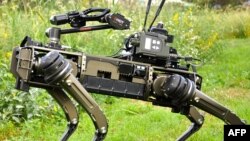 FILE - This handout image provided by Ghost Robotics shows the law enforcement configuration of the robot dog.