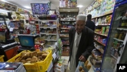 A man shops in a store, Feb. 9, 2024, in Algiers, Algeria.