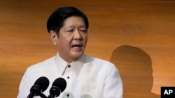 FILE - Philippine President Ferdinand Marcos Jr. delivers his second state of the nation address at the House of Representatives in Quezon City, Philippines, July 24, 2023.