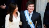 Argentina's incoming President Javier Milei stands next to Vice President Victoria Villarruel after their swearing-in ceremony at Congress in Buenos Aires, Dec. 10, 2023. 