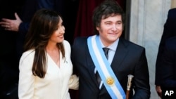 Argentina's incoming President Javier Milei stands next to Vice President Victoria Villarruel after their swearing-in ceremony at Congress in Buenos Aires, Dec. 10, 2023. 