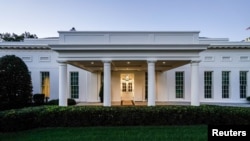 FILE - The White House West Wing entrance as seen early in the morning in Washington, Oct. 17, 2020. President Joe Biden will host Japanese Prime Minister Fumio Kishida and Philippines President Ferdinand Marcos Jr. in a White House summit on Thursday. 