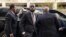 Atis Ayisyen-Ameriken Prakazrel (Pras) Michel ki te manm gwoup Fugees la, ak avoka li David Kenner rive nan tribinal federal Washington nan 30 Mas 2023, pou ouveti pwose li. 
