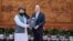In this photo provided by the Taliban, newly appointed Taliban ambassador Assadullah Bilal Karimi is reportedly presenting his credentials to Hong Lei, director-general of the protocol department at China's Foreign Ministry, in Beijing on Dec. 1, 2023.