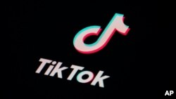 FILE - The icon for the video-sharing TikTok app is seen on a smartphone, Feb. 28, 2023, in Marple Township, Pa. The Biden '24 presidential campaign is using TikTok despite security concerns about it.