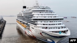 China's first domestically built cruise ship, the Adora Magic City, sets sail on its maiden voyage in Shanghai, on Jan. 1, 2024. (AFP)