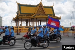 Supporters of Cambodia’s Prime Minister Hun Sen and the Cambodian People’s Party (CPP) attend an election campaign for the upcoming national election in Phnom Penh, on July 1, 2023. (Cindy Liu/Reuters)