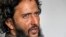 Fahad Shah, founder and editor of news portal The Kashmir Walla, speaks with the Associated Press at his residence on the outskirts of Srinagar, Indian controlled Kashmir, Nov. 24, 2023.