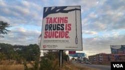 A billboard warns of the dangers of drug use, in Harare, Zimbabwe, June 25, 2024. (Columbus Mavhunga/VOA)