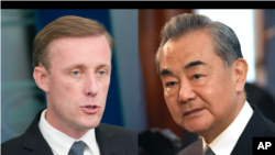 美国国家安全顾问杰克·沙利文（Jake Sullivan）(左）和中国外交部长王毅。