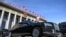 FILE - An Aurus limousine of Russian President Vladimir Putin's motorcade is parked outside the Great Hall of the People during the Belt and Road Forum in Beijing, China, Oct. 18, 2023.