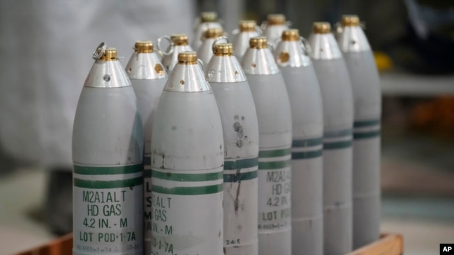 FILE - Canisters of mustard gas, which are part of the United States' chemical weapons stockpile, wait for destruction at the US Army Pueblo Chemical Depot, June 8, 2023, in Pueblo, Colo.