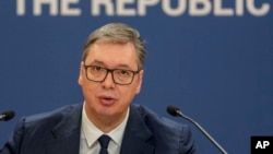 FILE - Serbian President Aleksandar Vucic speaks during a public address in Belgrade, Feb. 2, 2024. Vucic said, Oct. 20, 2024, Serbia will continue to refuse to impose sanctions against Russia over its invasion of Ukraine despite Western pressure.