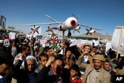 Houthi supporters attend a rally against the U.S.-led strikes on Yemen and Israel's war in Gaza Strip, in Sanaa, Yemen, Feb. 23, 2024.