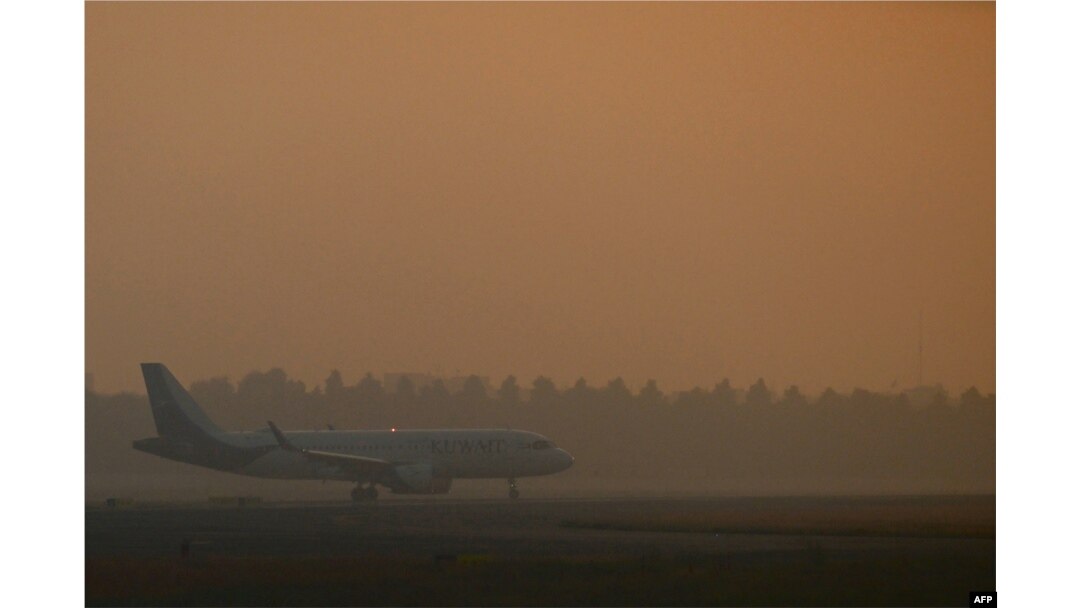 A Kuwait Airways aircraft prepares to take off during heavy air pollution at Indira Gandhi International Airport in New Delhi, India, Oct. 27, 2023.