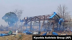 This photo provided by the Kyunhla Activists Group shows aftermath of an airstrike in Pazigyi village in Sagaing Region's Kanbalu Township, Myanmar, Tuesday, April 11, 2023.
