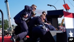 Abashinzwe umutekano bahise bamwubarara hejuru