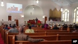 Congregants sit in largely empty pews during service at Zion Baptist Church, April 16, 2023, in Columbia, S.C.